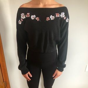 Sweater with embroidered flowers